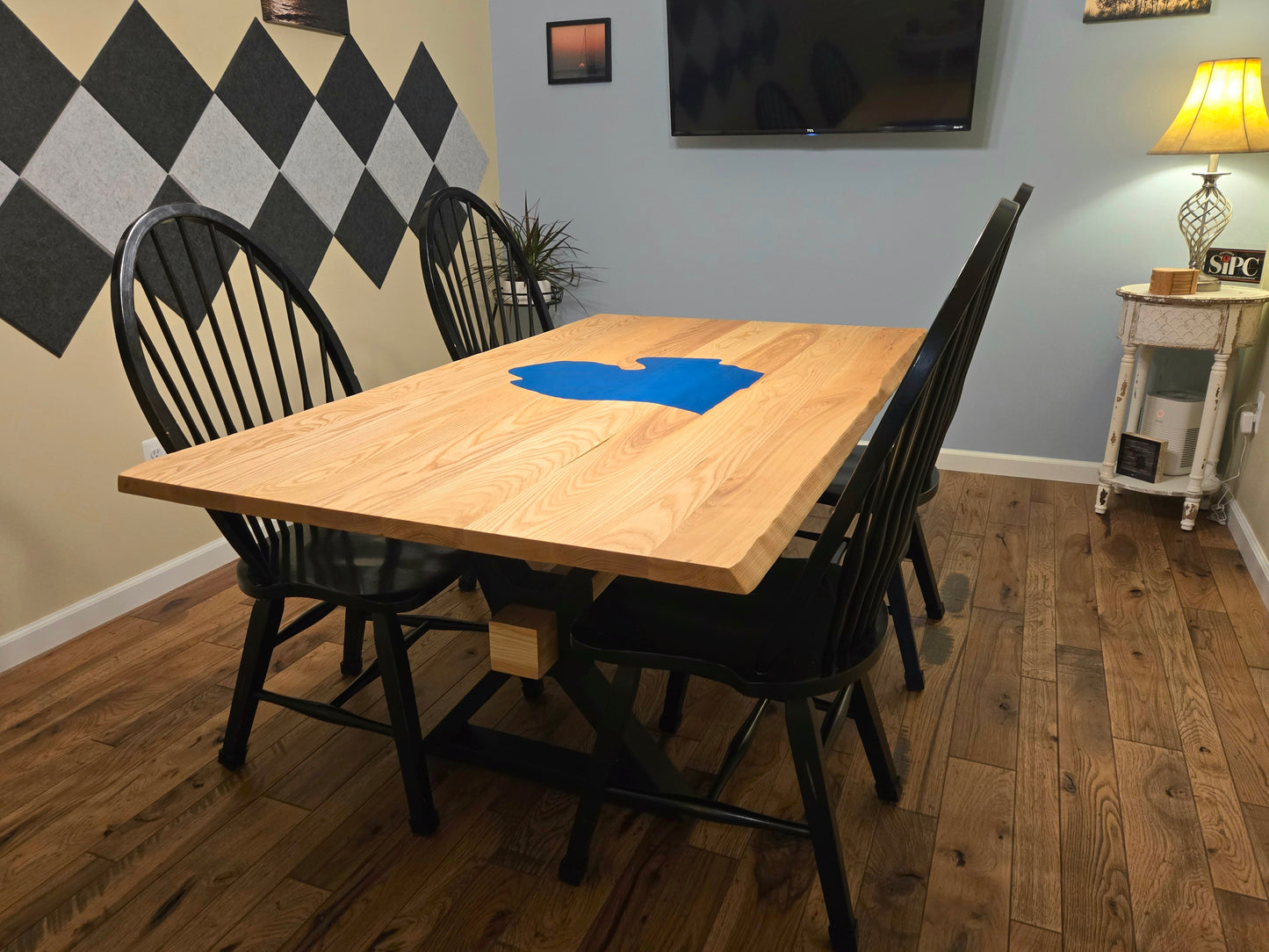 Ash conference table with blue epoxy Michigan in the center. Includes custom metal X-shaped legs with decorative ash beam.