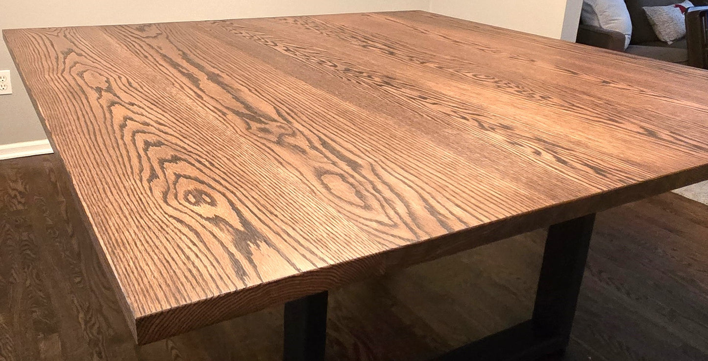 Square red oak dining room table with custom metal legs