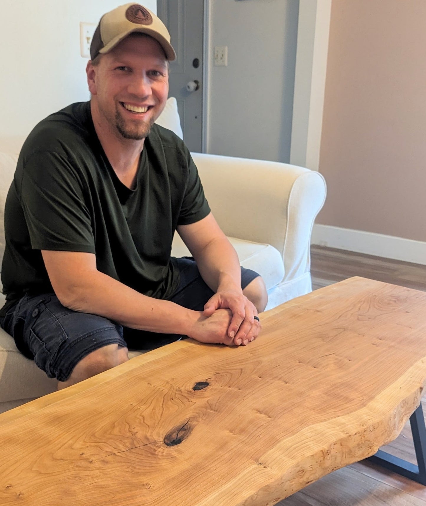 Live edge cherry coffee table with custom contemporary metal legs