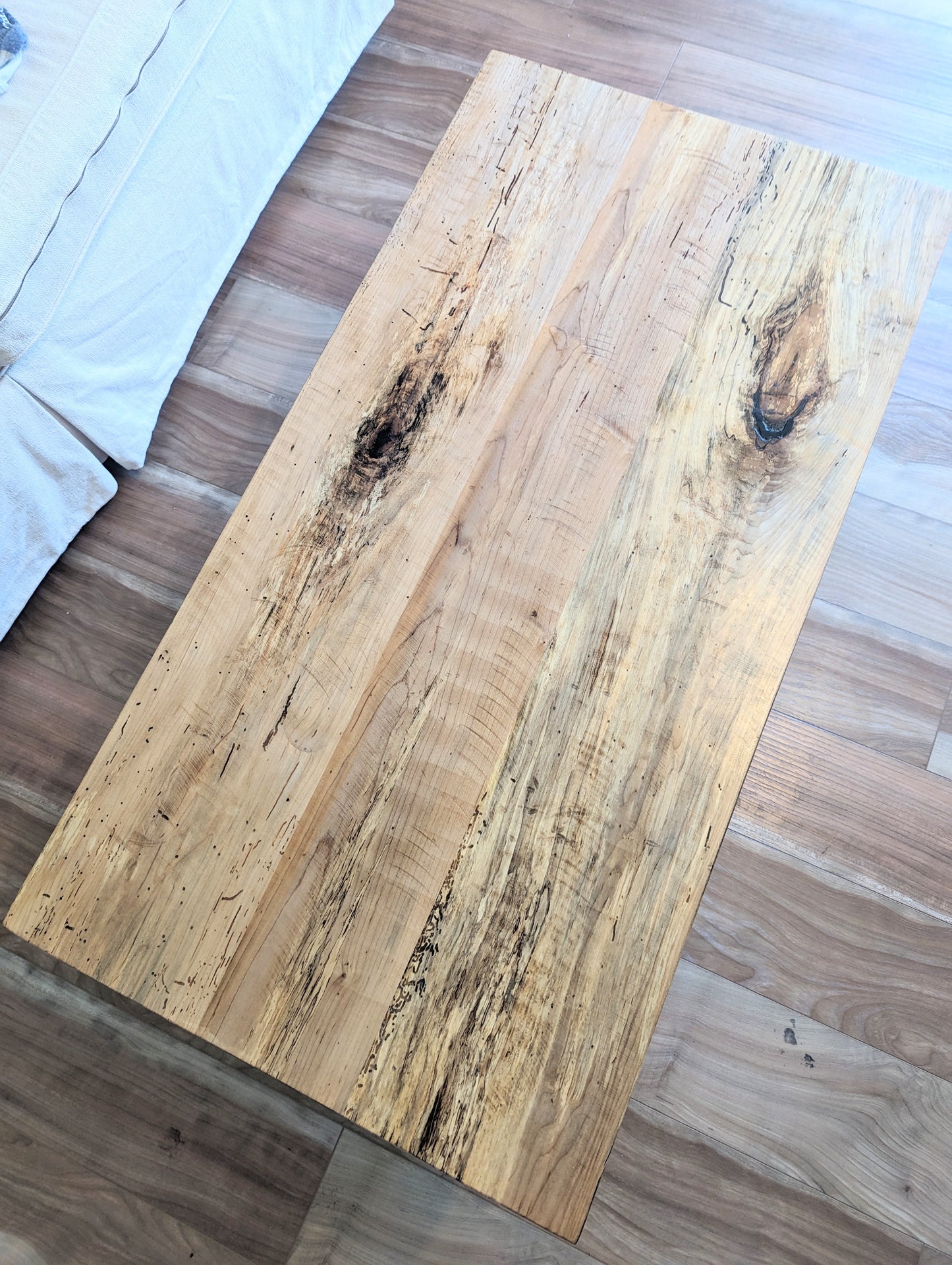 Rustic spalted maple coffee table with thick squared metal legs