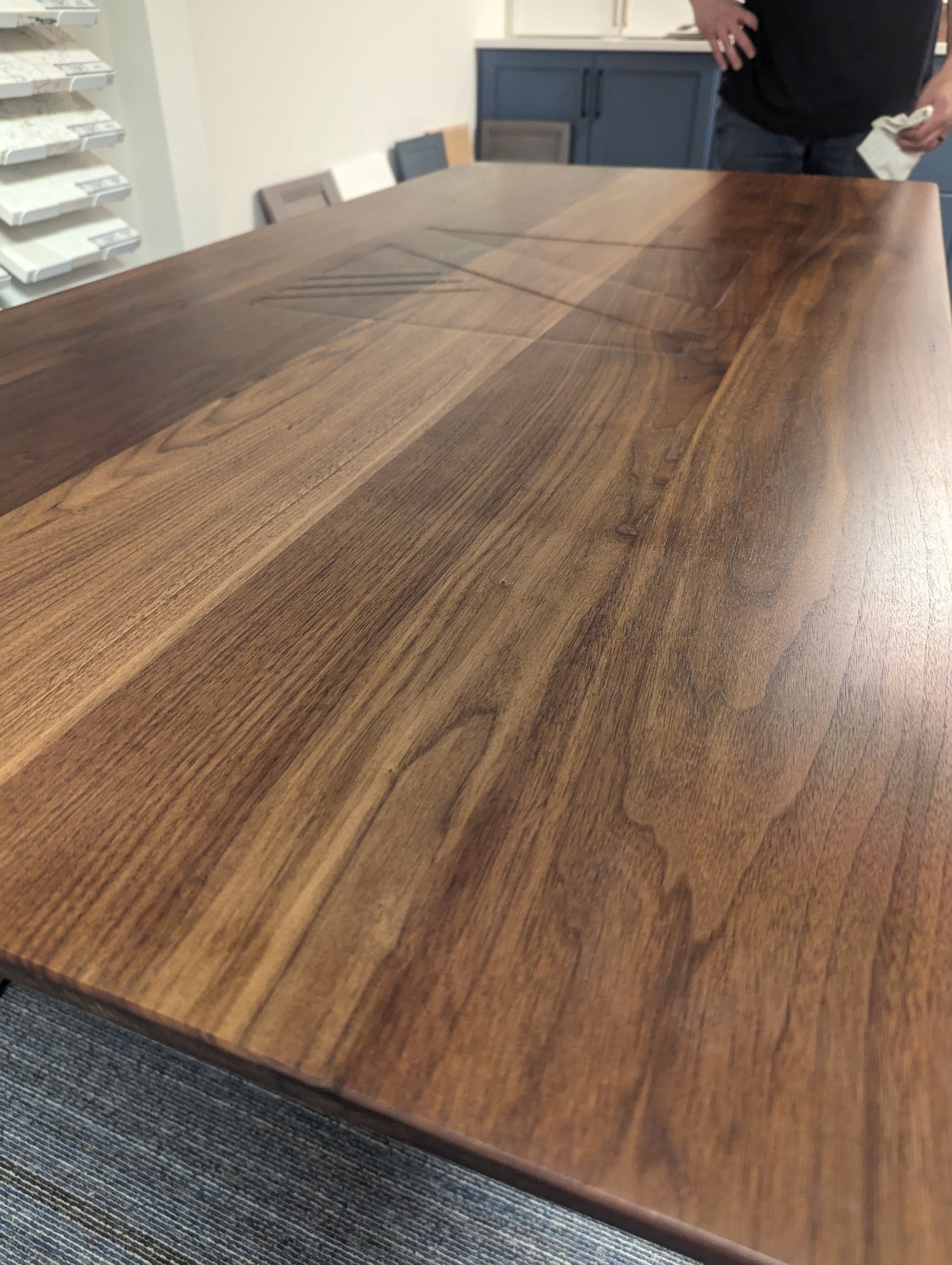 Walnut and ash conference table with contemporary wood legs