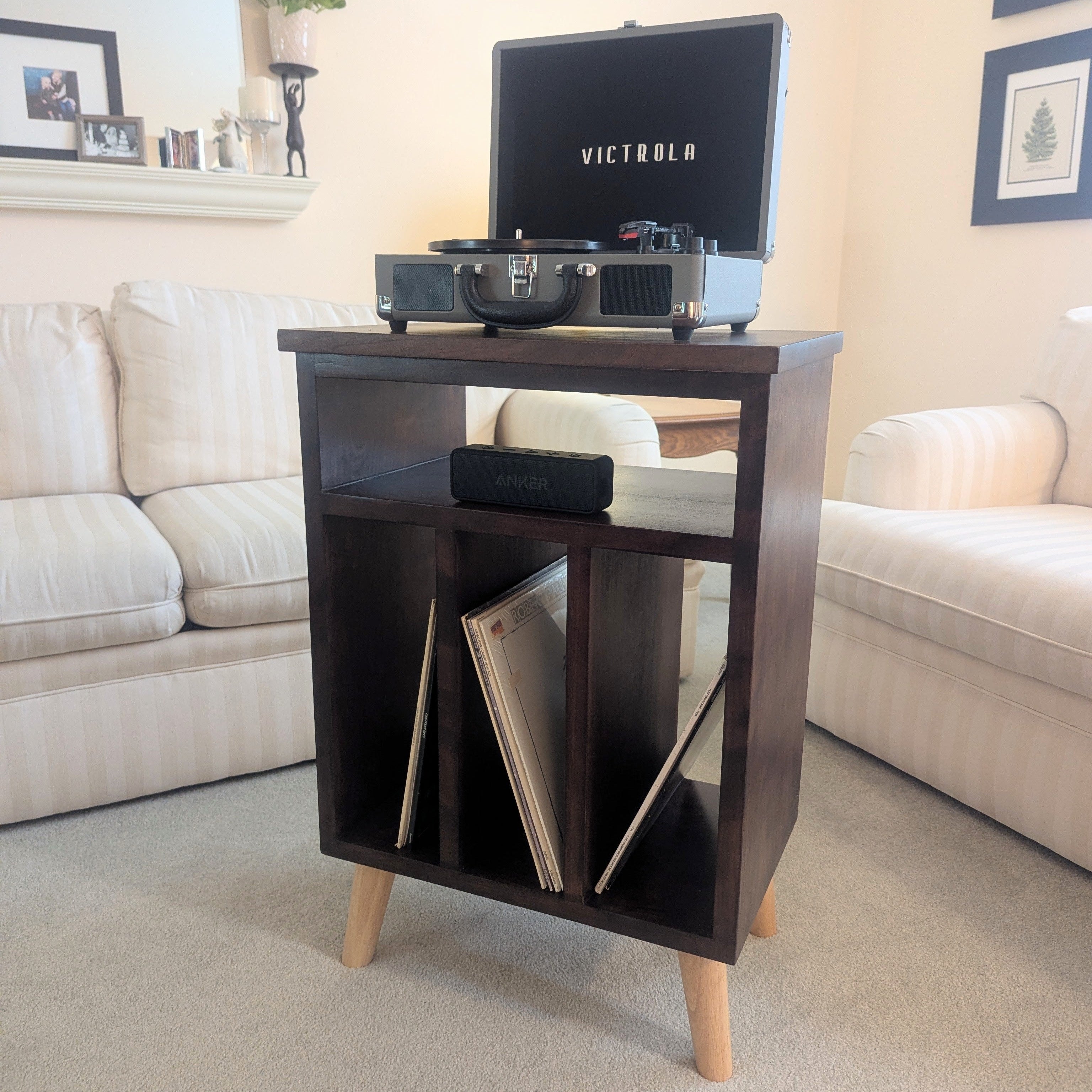 Stained cherry hardwood vinyl record storage cabinet with contemporary legs.